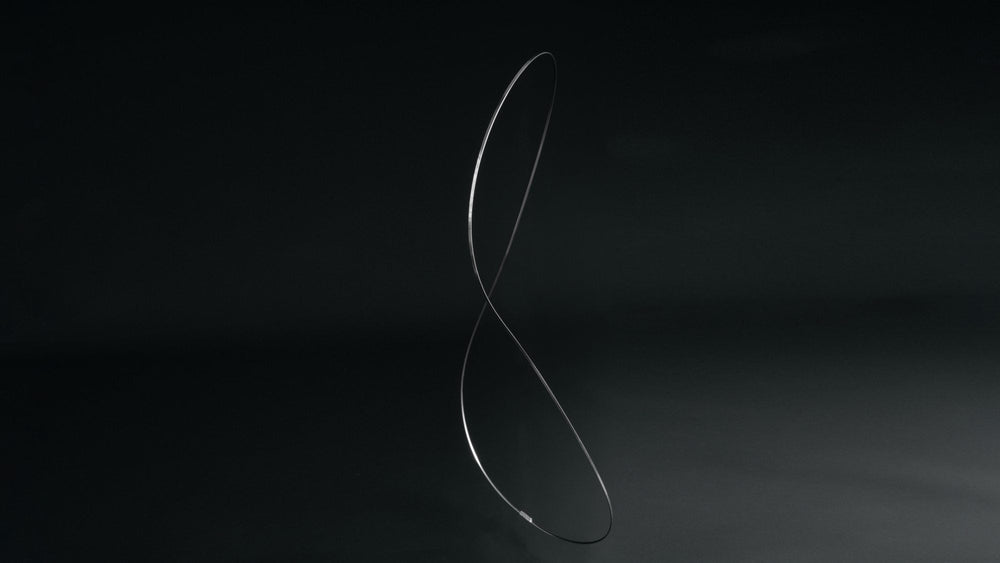 Spring steel frame on black background