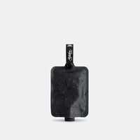 Charcoal FlatPak Toiletry Bottle on white background