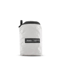 packed up arctic white duffle on white background