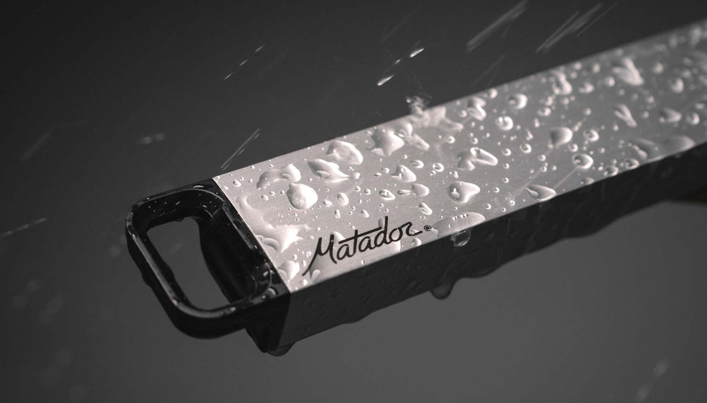 close up of pill canister on dark gray background, covered in beaded water