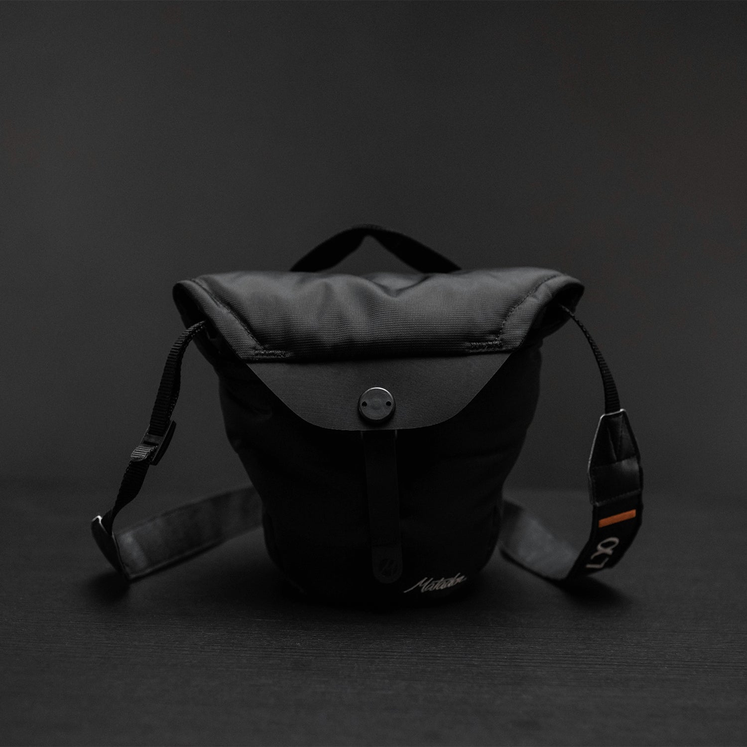 Front view of compressed Camera Base Layer on black background