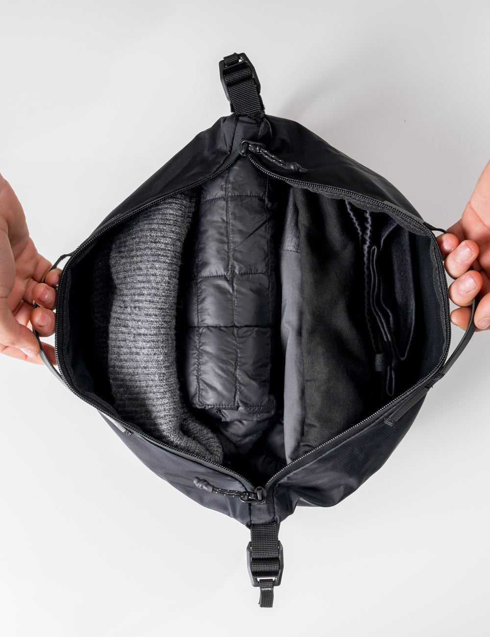 top down view of gear cube full of clothing