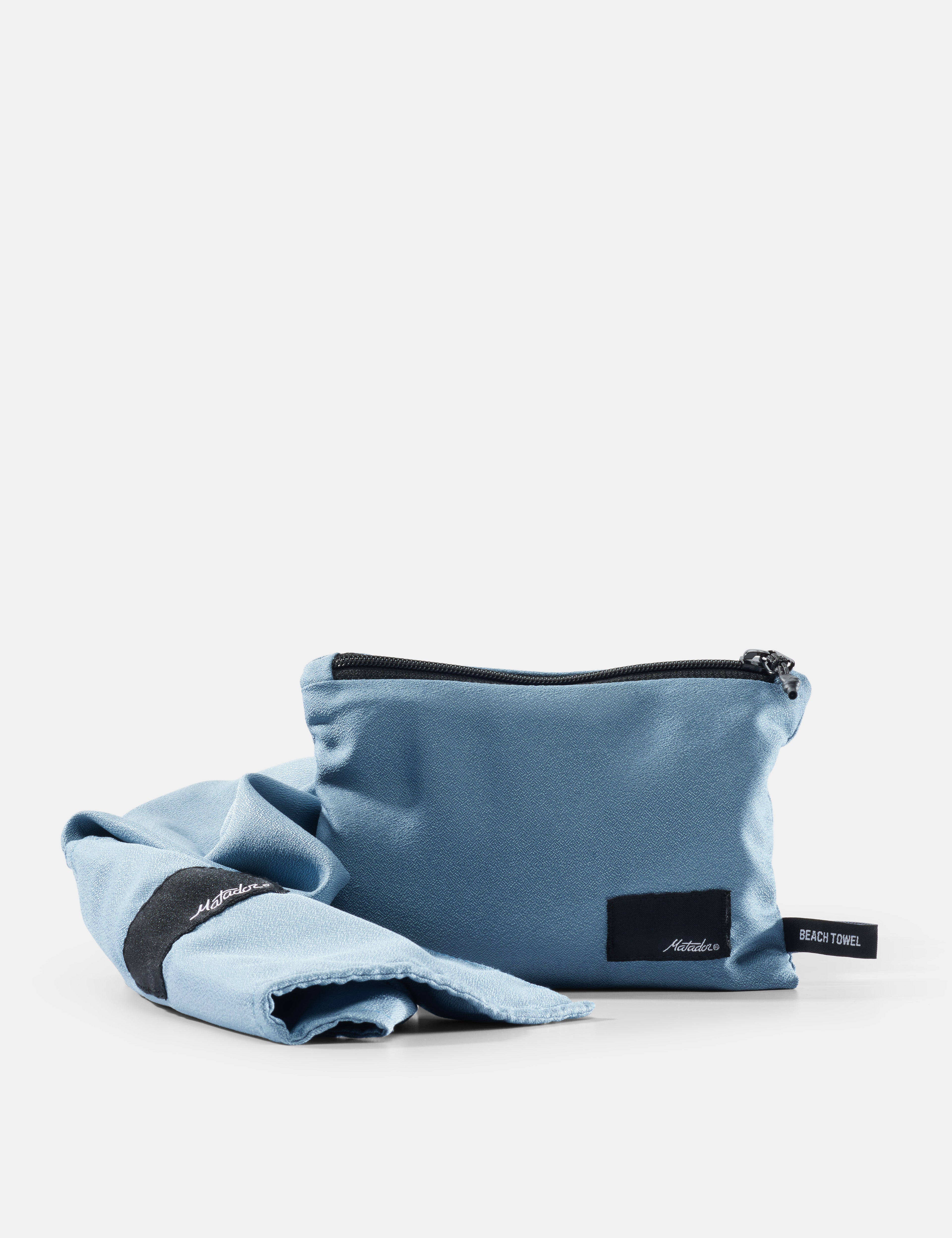 Slate beach towel and pouch on white background