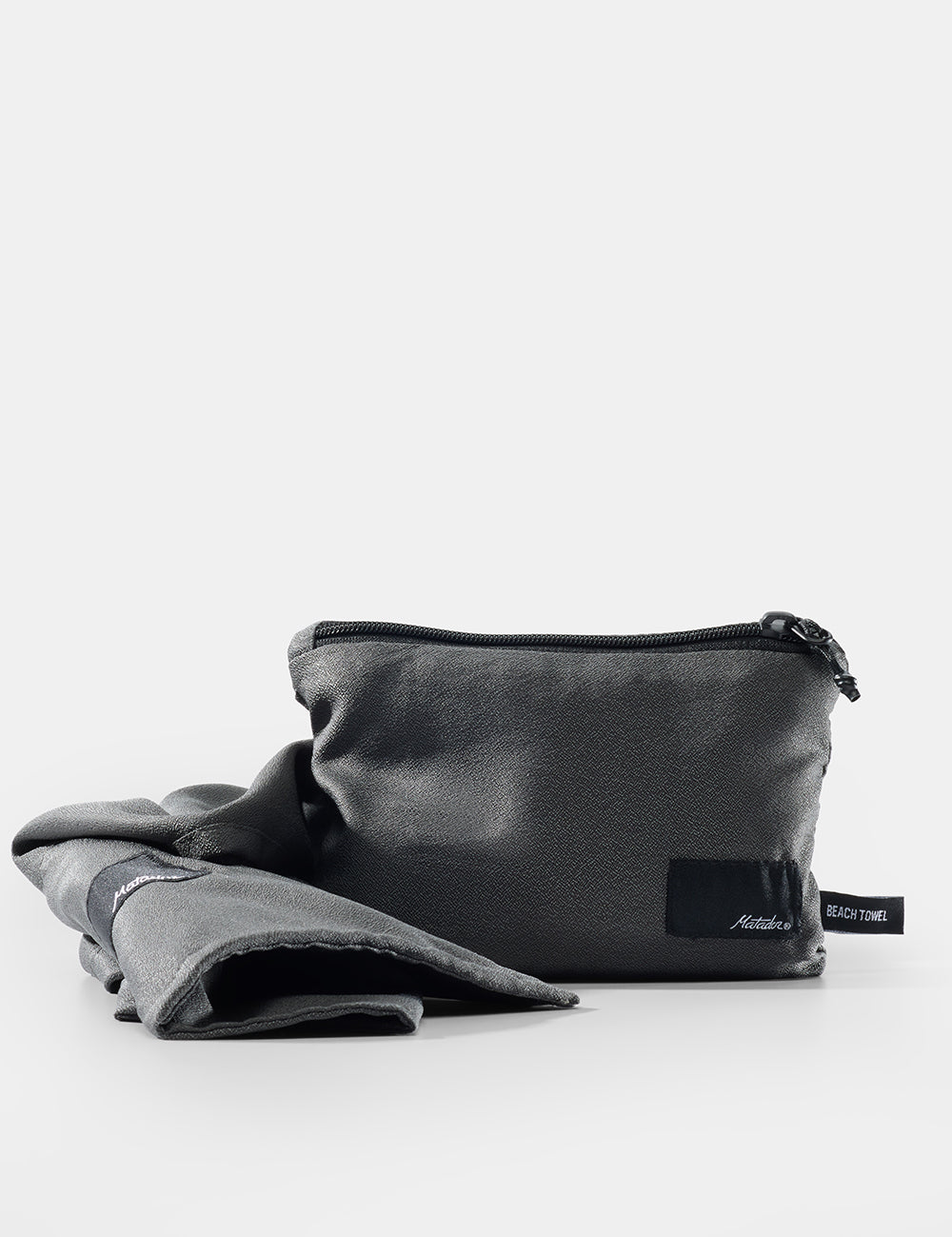 gray pouch with a label on a white background
