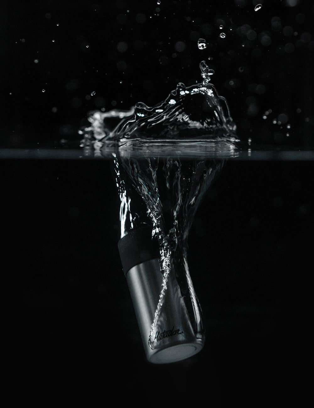 small canister fully submerged in water