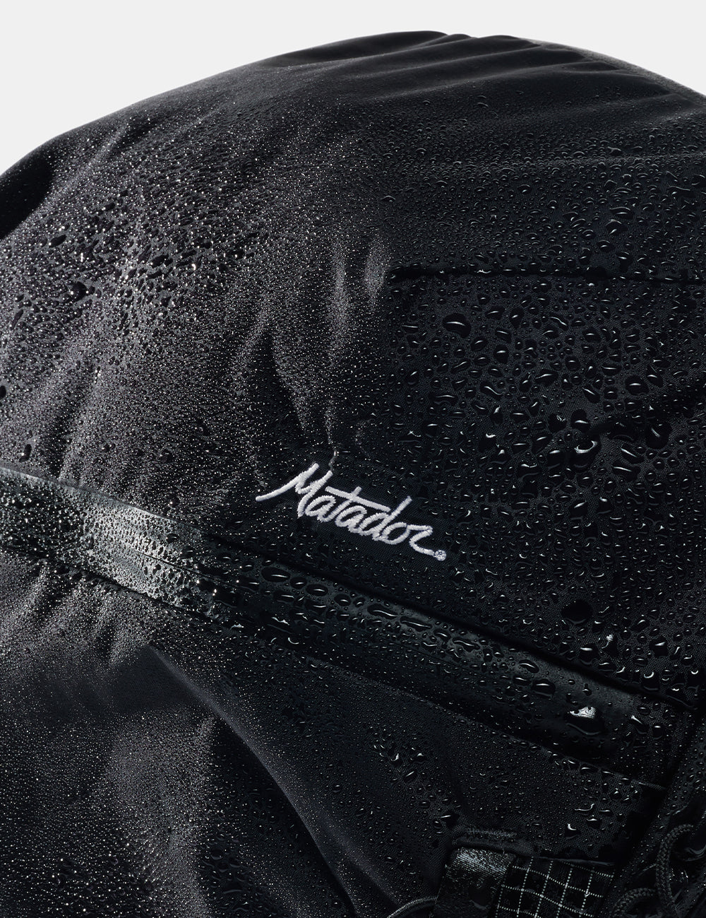 close up view of water beading on black matador fabric