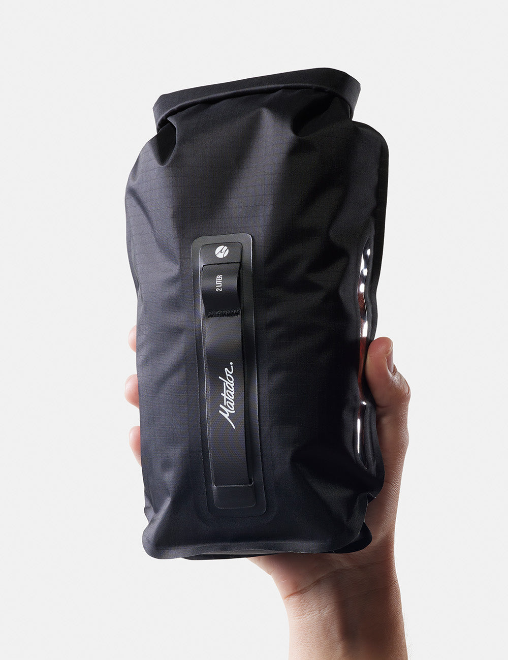 hand holding dry bag