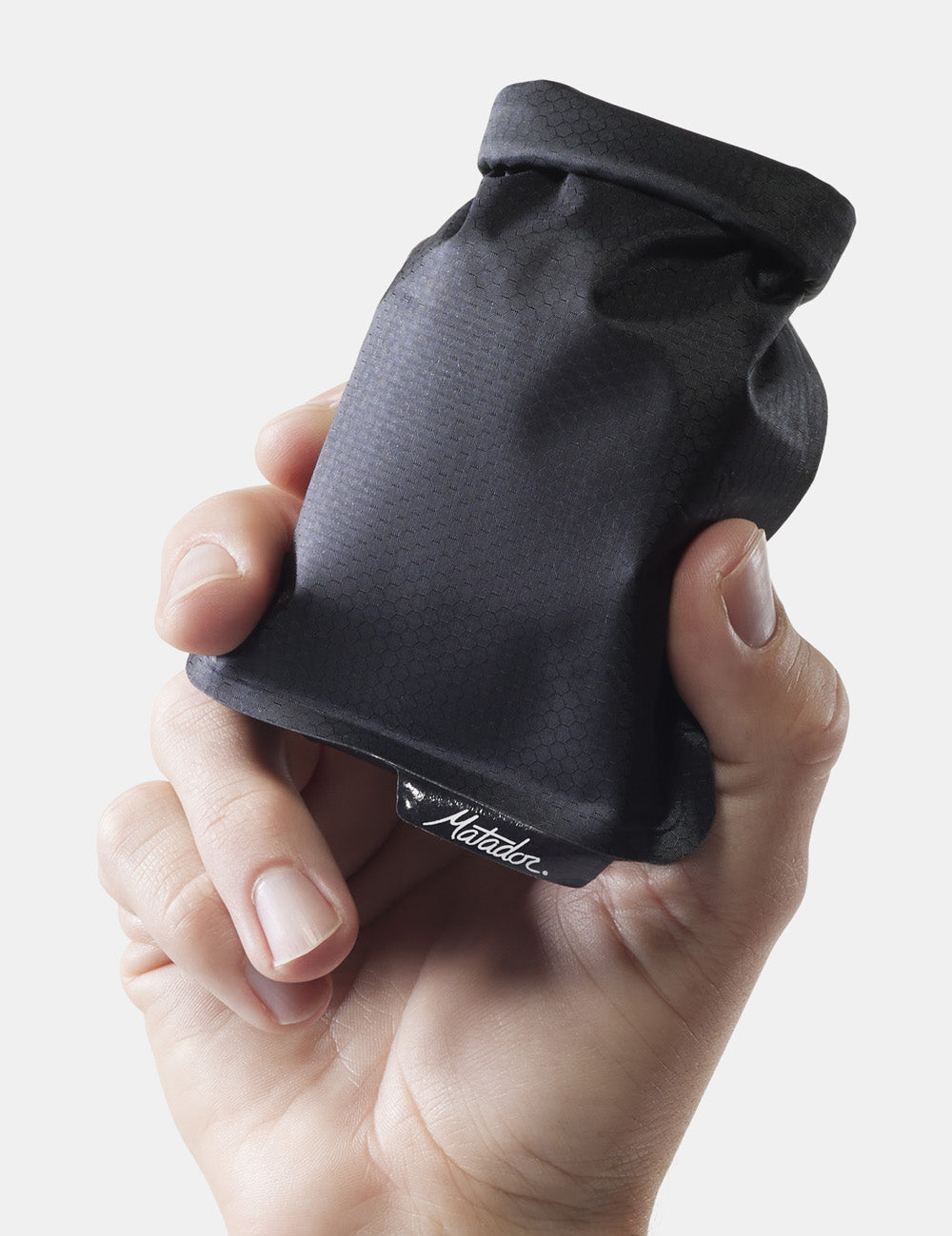 hand holding black soap bar case