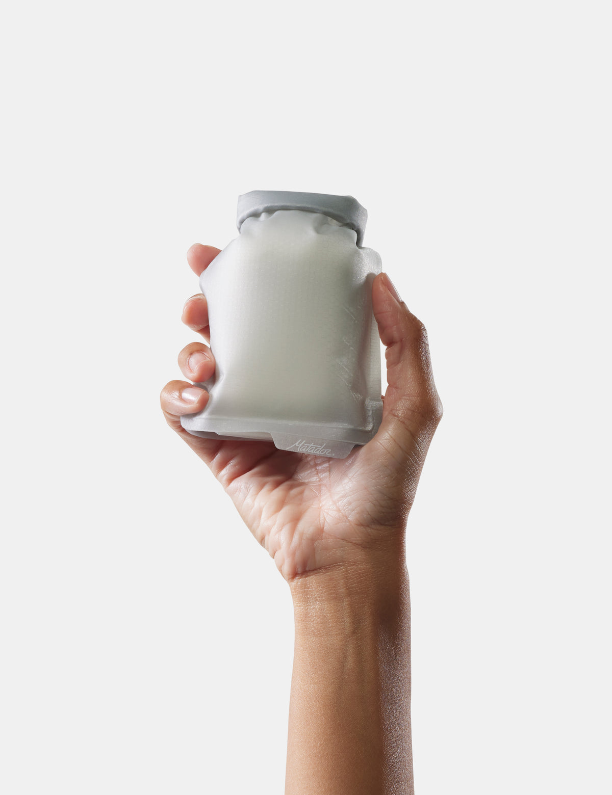 hand holding white soap bar case on white background