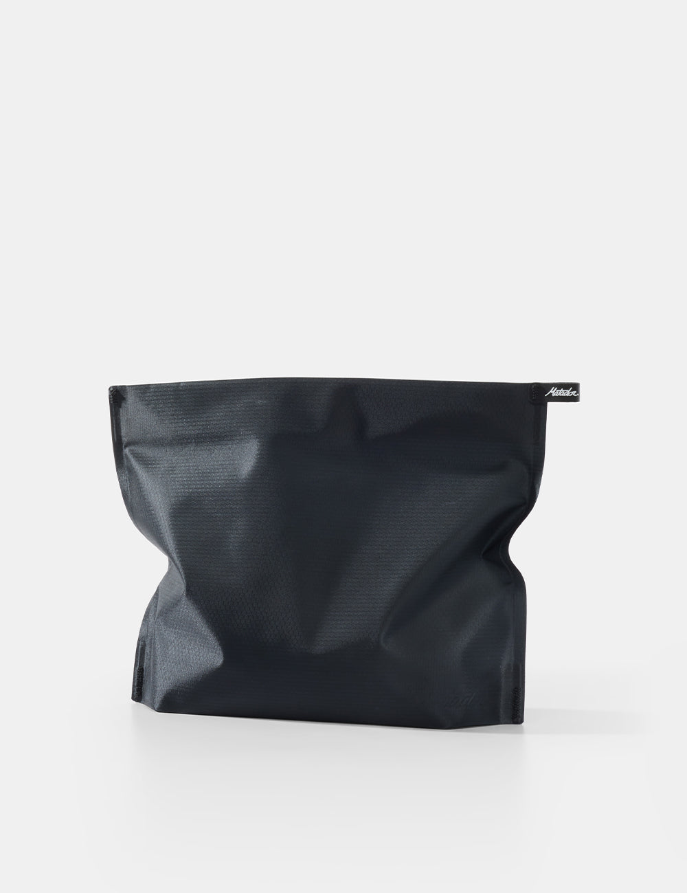 Black toiletry case on a white background