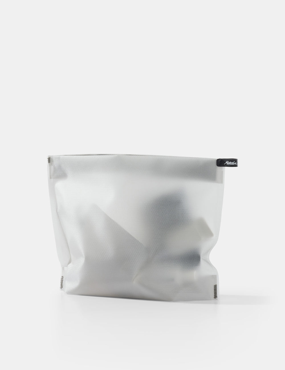 white toiletry case on white background