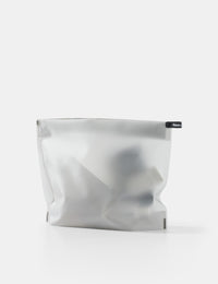 white toiletry case on white background