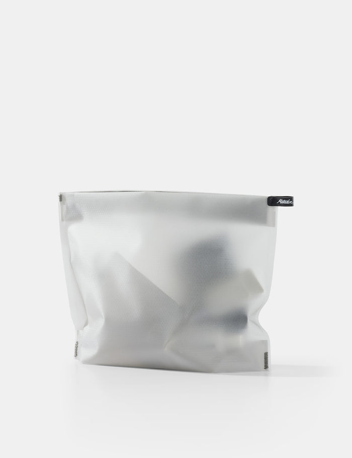 white toiletry case on white background
