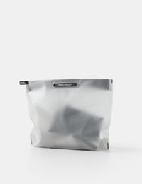 white toiletry case on white background