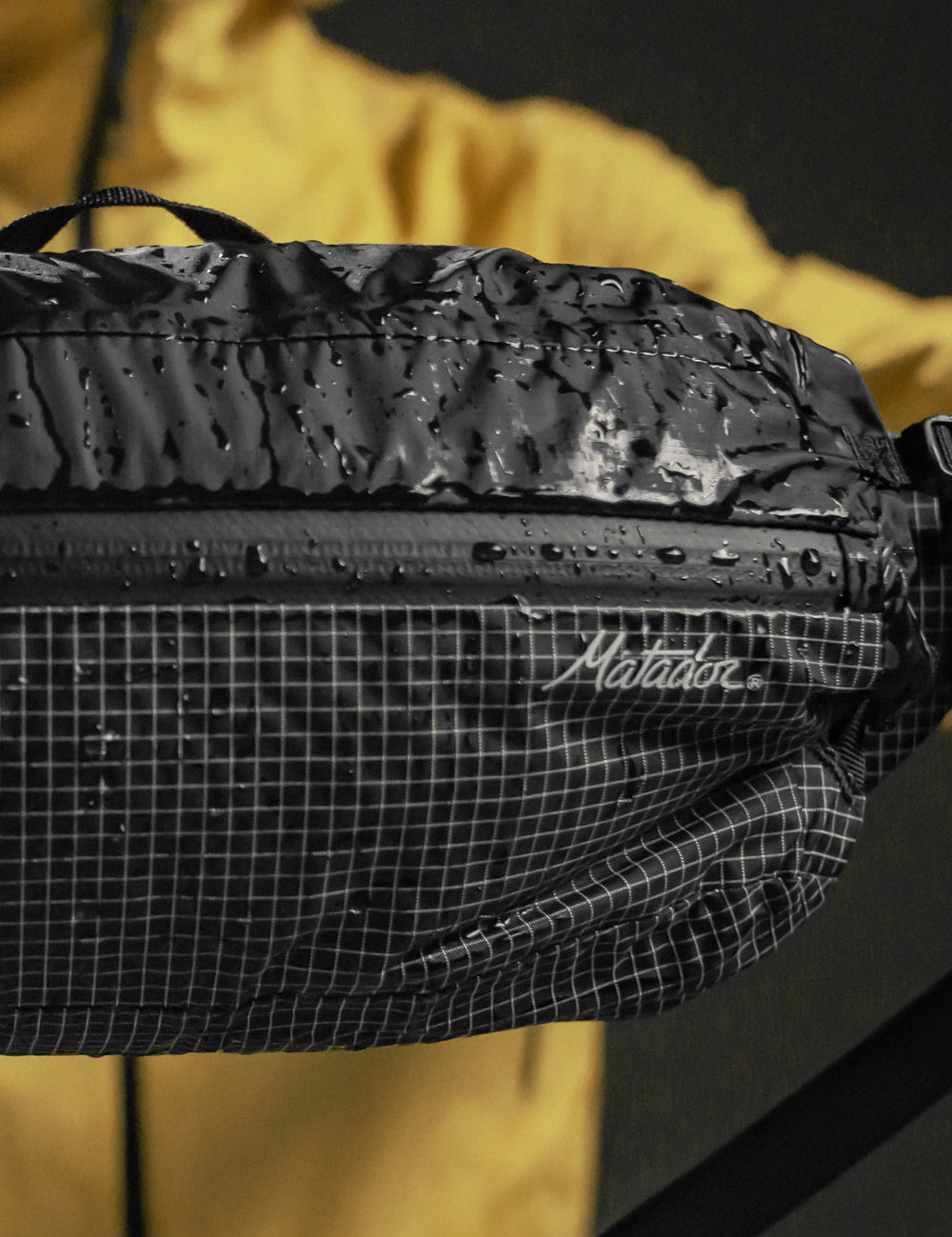 close up view of hip pack with water droplets on it