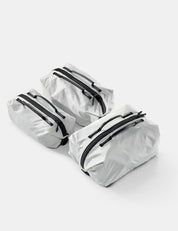 3 white gear cubes on white background