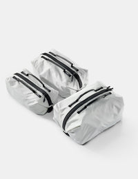 3 white gear cubes on white background