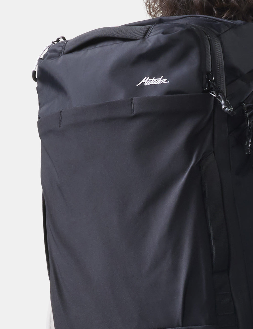 Front Stash Pocket of black backpack