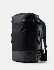 Black travel backpack on a light gray background