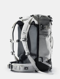 Gray backpack with multiple straps on a white background