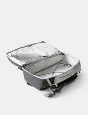 Gray backpack with open lid on a white background