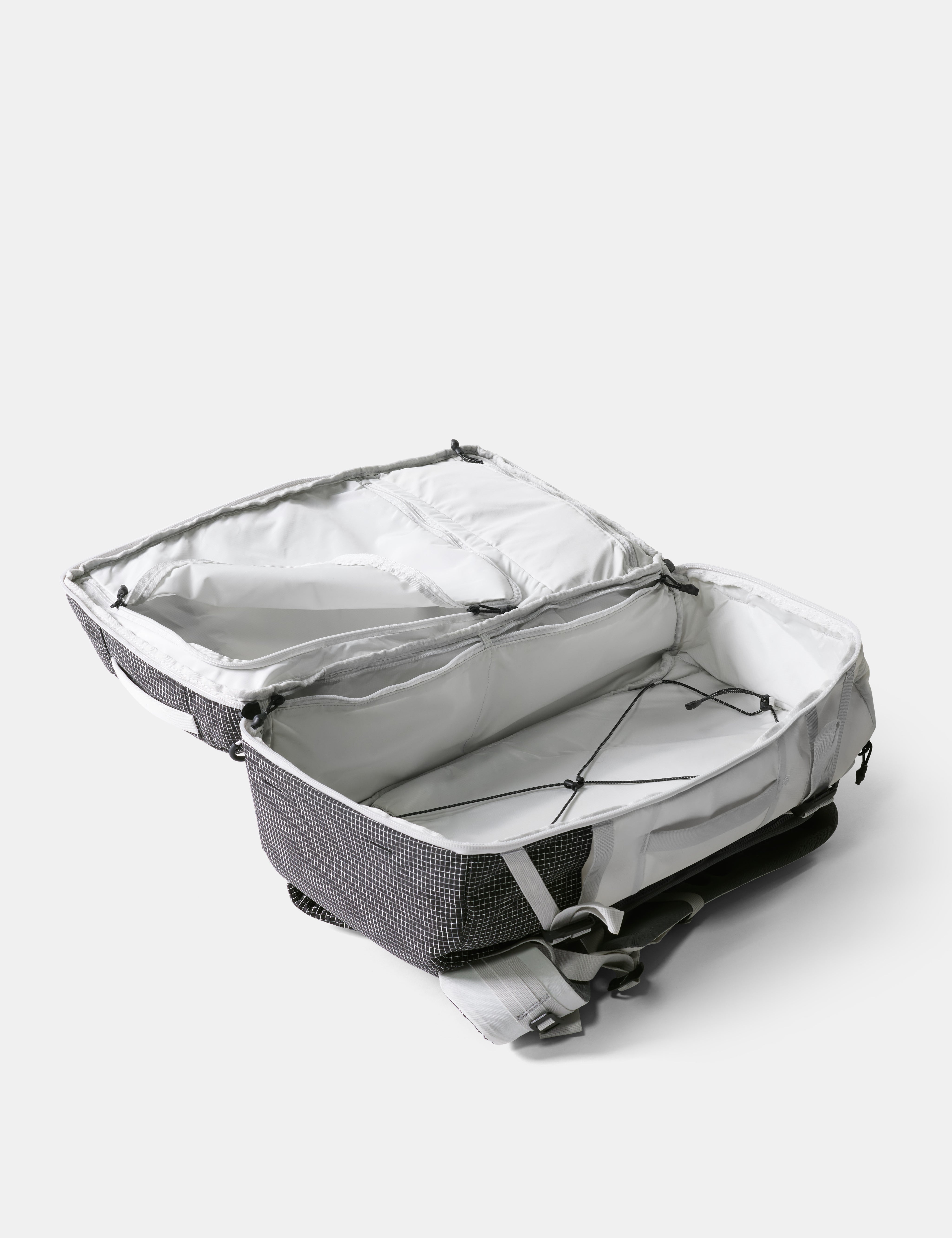 Gray backpack with open lid on a white background