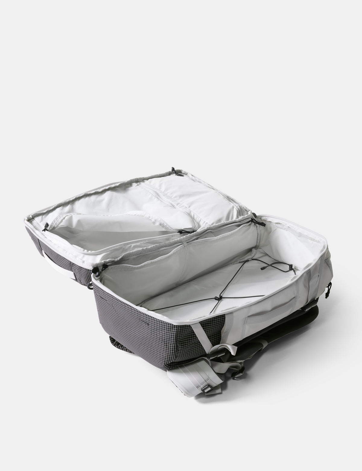 Gray backpack with open lid on a white background