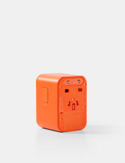 Orange power adapter on a white background