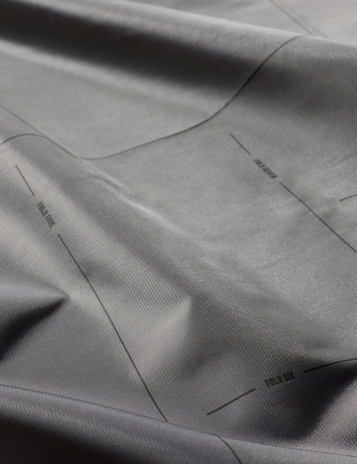 Close-up of gray fabric with subtle texture