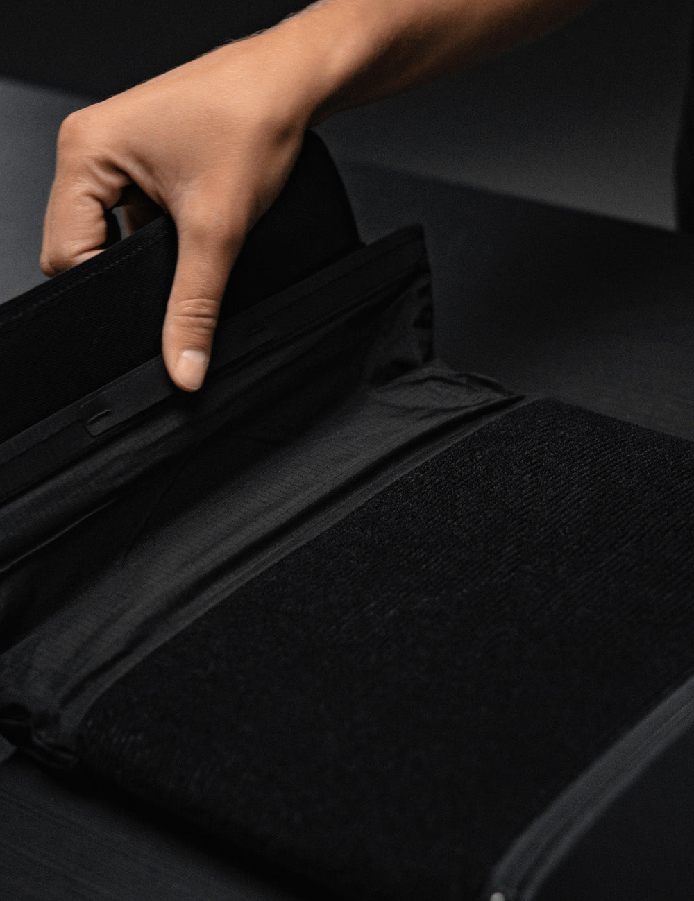 detail view of hook and loop closure of laptop baselayer