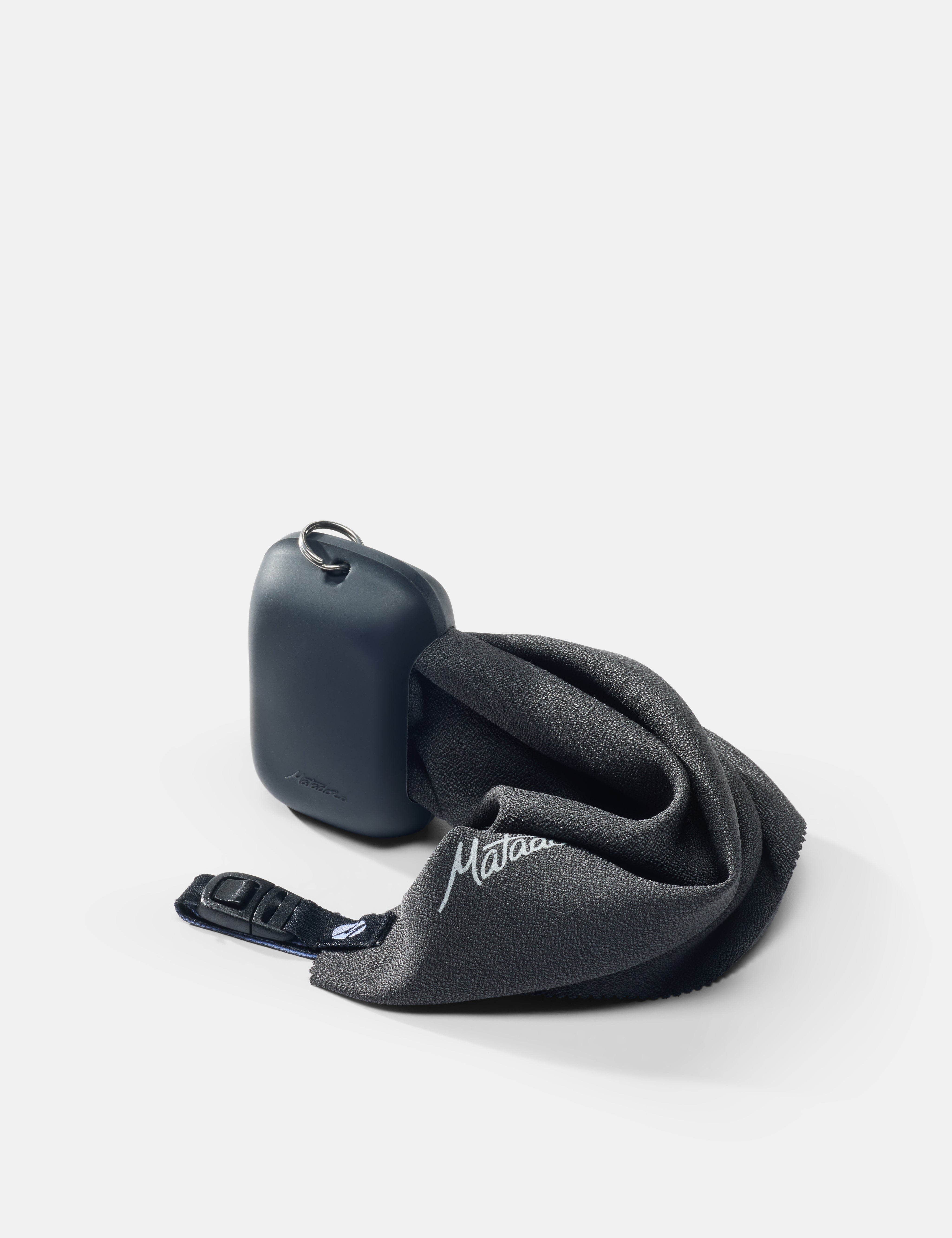 gray towel case and towel on a white background