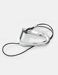Silver carabiner with a black cord on a white background