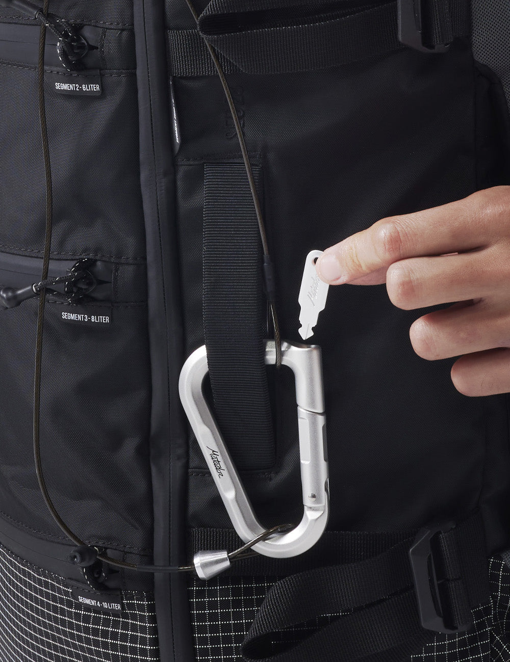 betalock and accessory cable being used to lock backpack