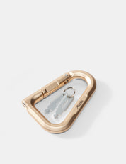 gold carabiner with a keychain on a white background