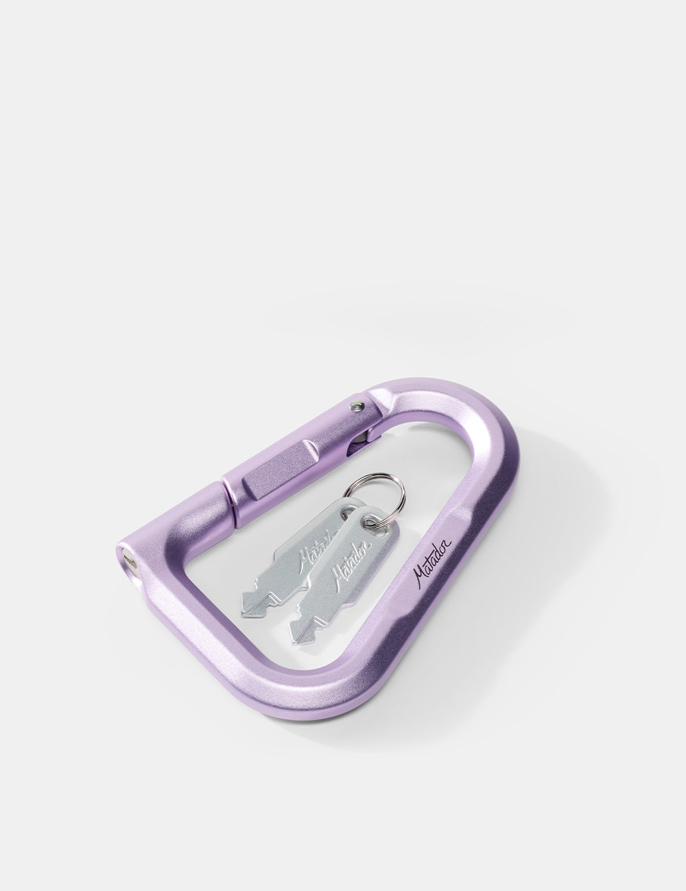 Purple carabiner with a keychain on a white background