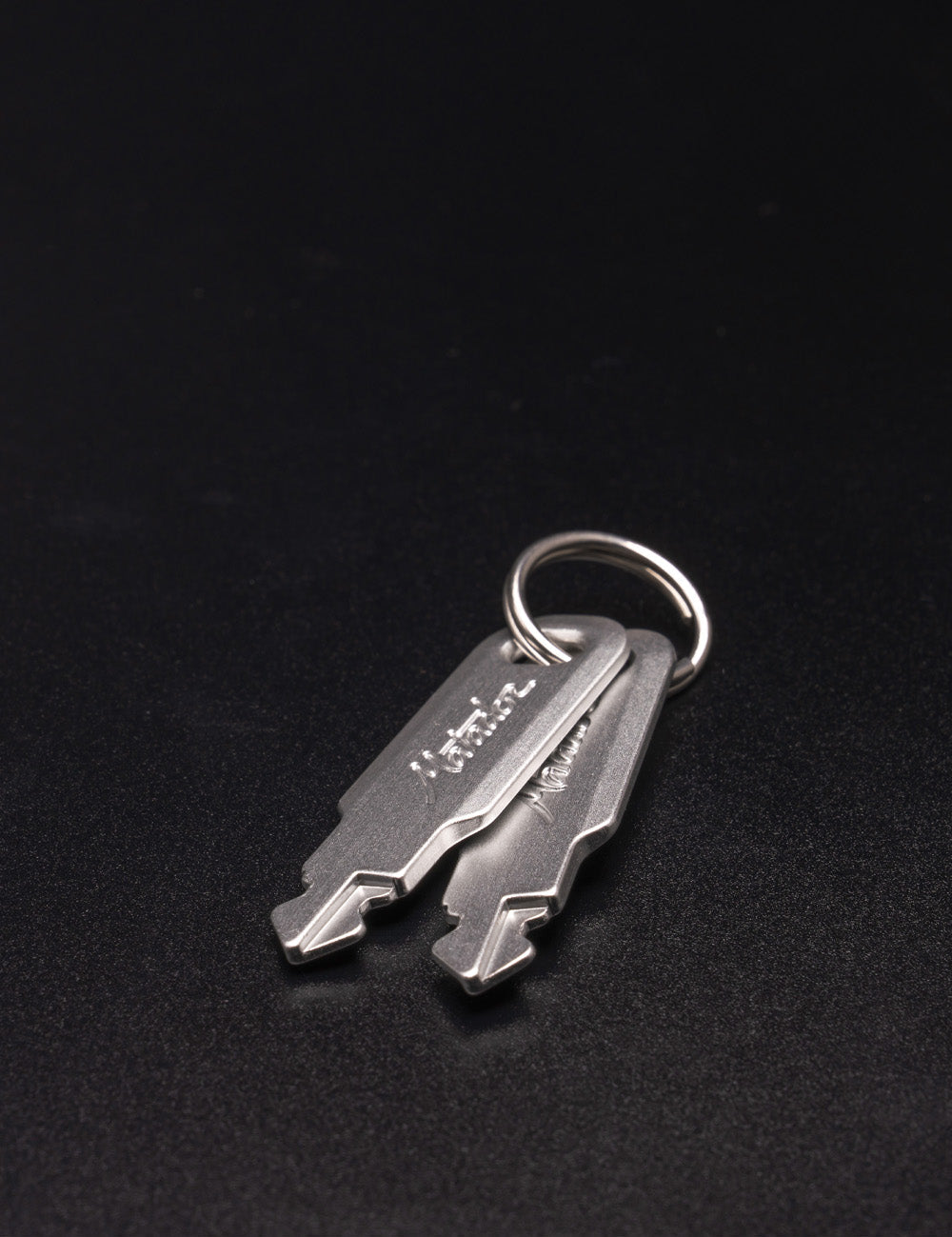 2 keys on black black background