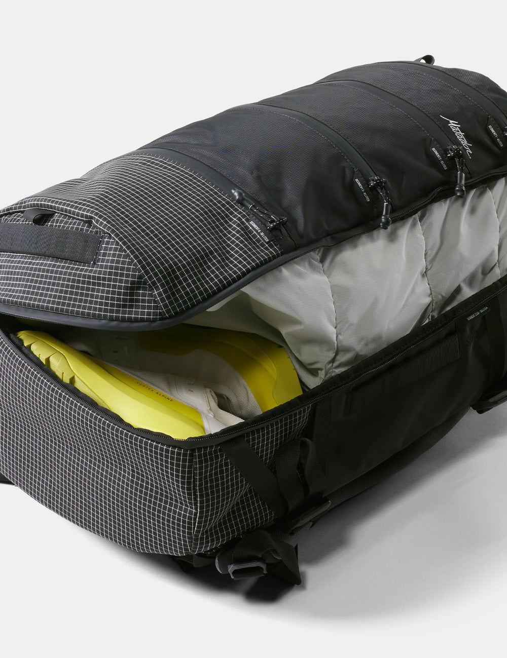 detail view of clamshell opening with neon yellow shoes