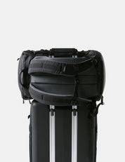 Black backpack  on a light gray background