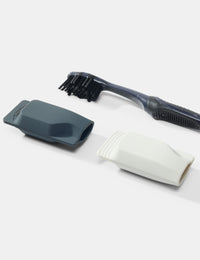 black toothbrush and 2 caps on a white background