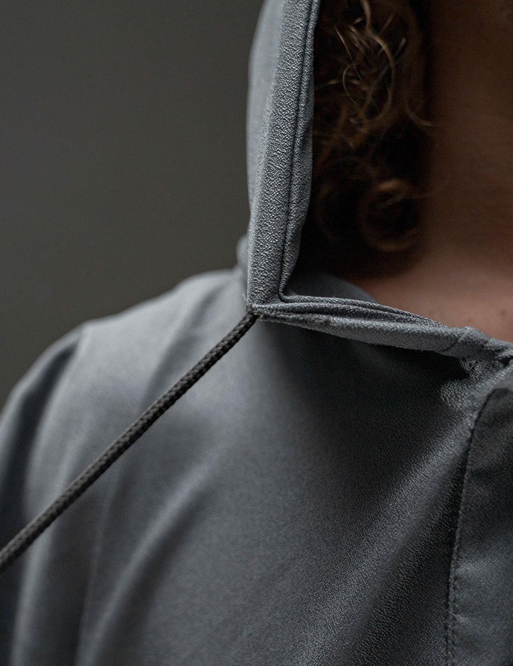 close up view of poncho hood and string